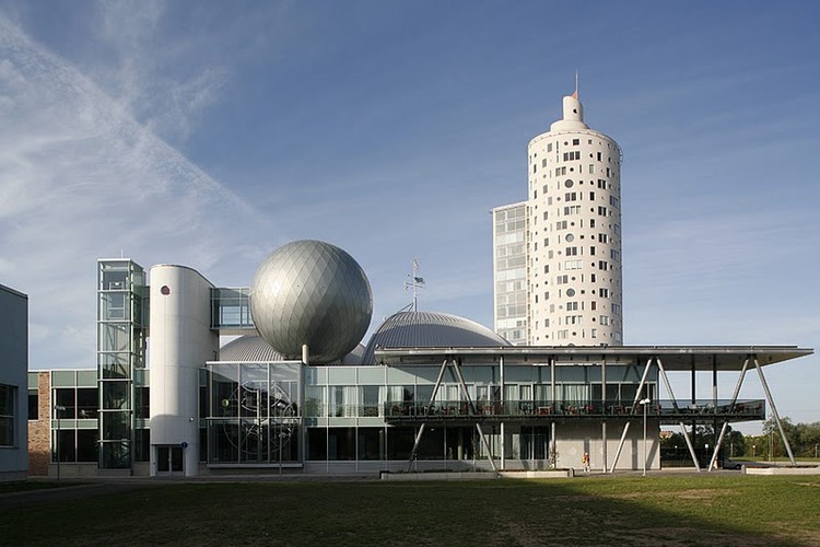 The building in the image is the Science Centre AHHAA, located in Tartu, Estonia.
