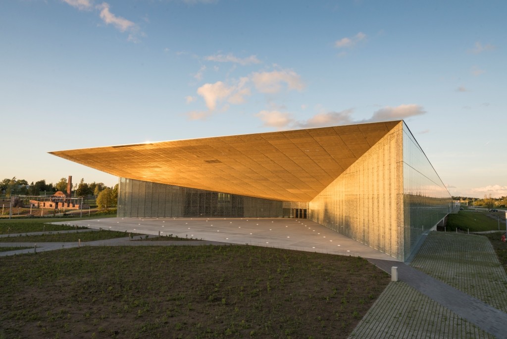 The image displays the main building of the Estonian National Museum located in Tartu, Estonia.