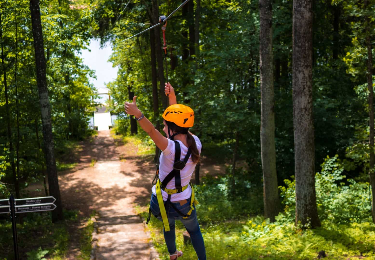 This image captures a moment at the ZZZIPPP aerial cable run in Alūksne, Latvia