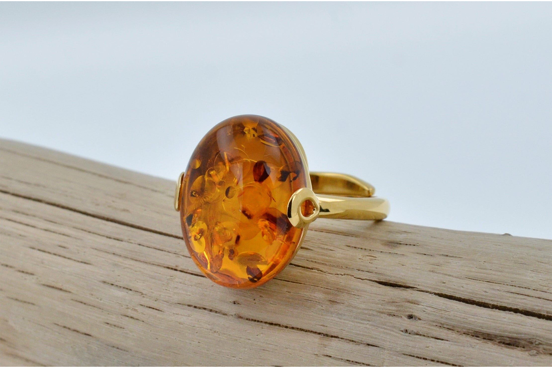 Amber ring on wood