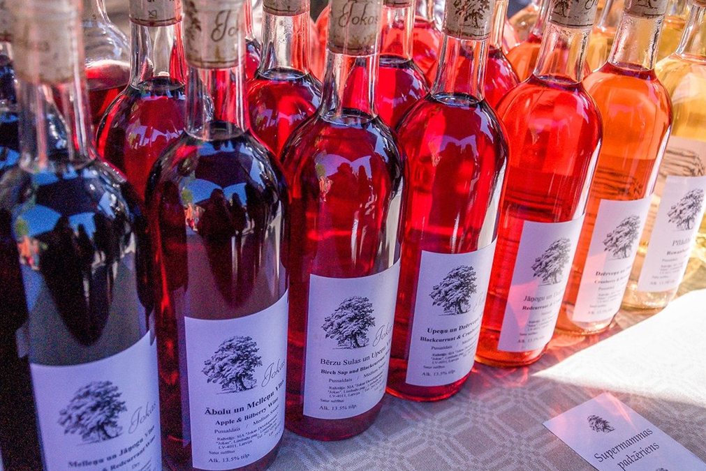 Selection of colorful Baltic fruit and berry wines